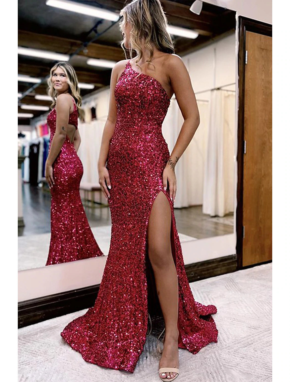 Elegant sequined mermaid trumpet prom dress with one shoulder and high slit.