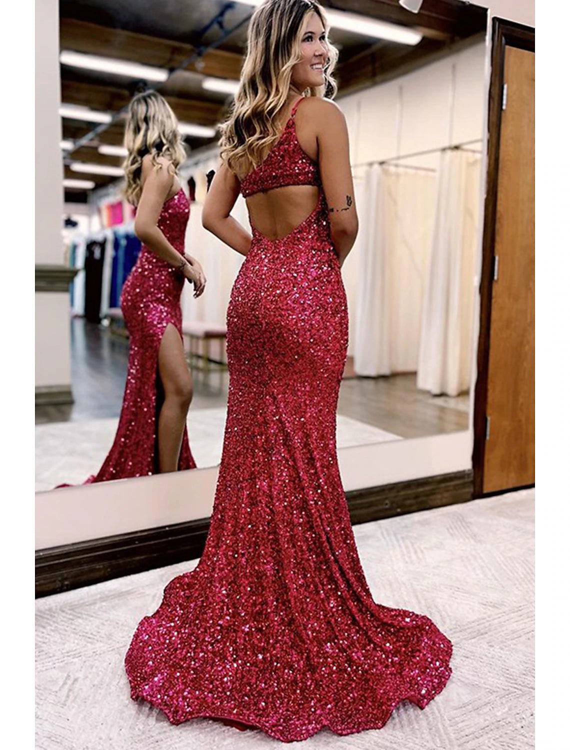 Sparkly one-shoulder mermaid trumpet gown with court train, perfect for formal events.