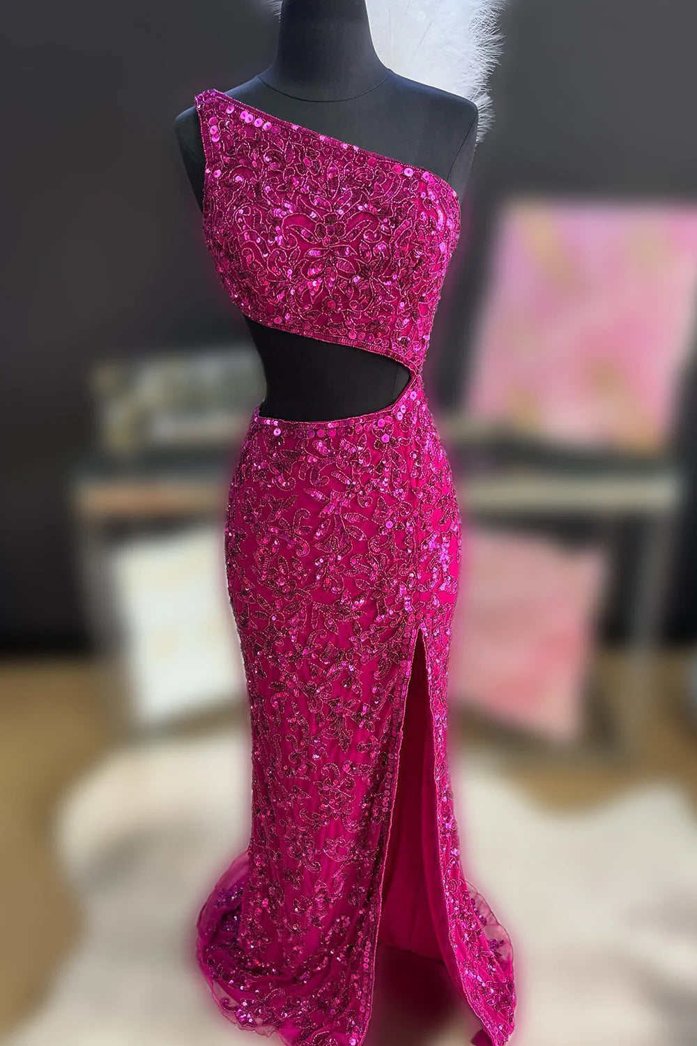 Full length view of the sparkly sequins one-shoulder prom dress with a flowing mermaid skirt.