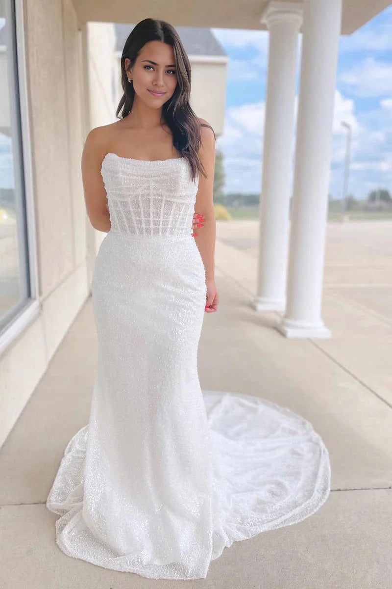 Sparkly sequins mermaid strapless wedding dress.