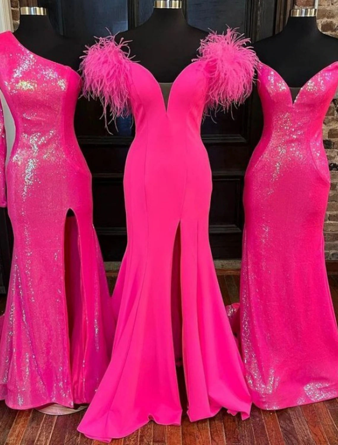 Sparkly sheath prom dress with sweetheart neckline, feather, sequin, and a high slit.
