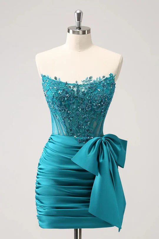 Close-up of the beaded appliques on a sparkly strapless homecoming dress.