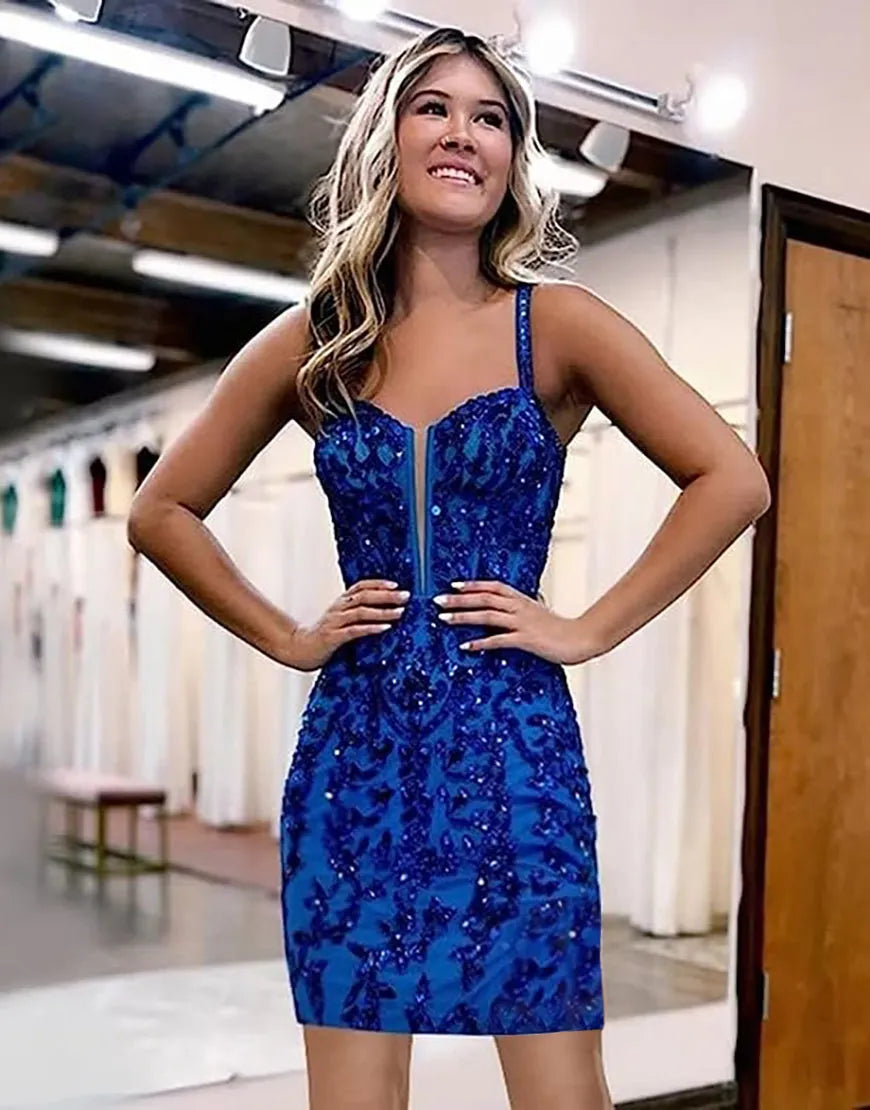 Sparkling sequin mini dress with lace-up back.