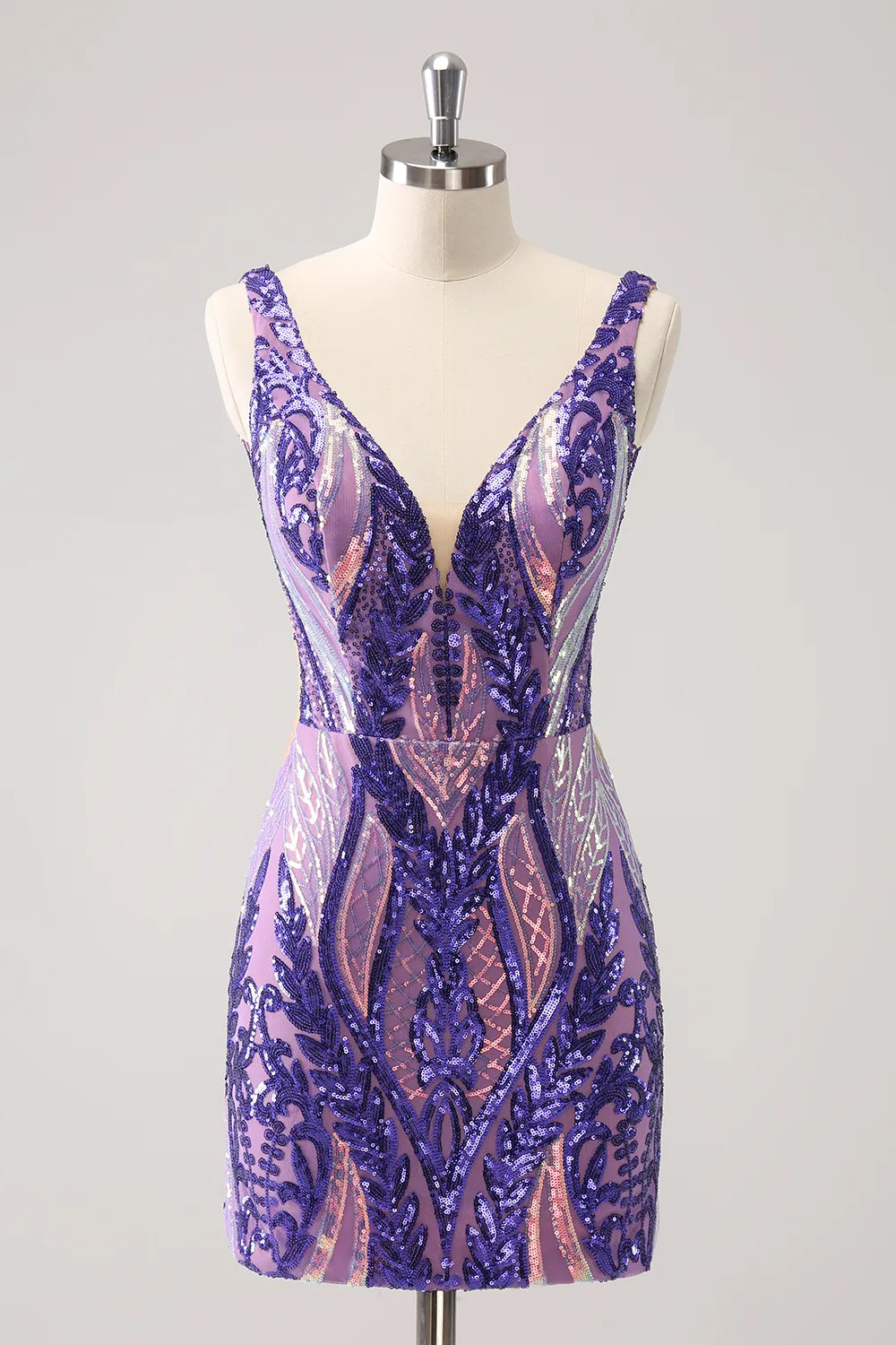 Woman wearing a purple sparkly V-neck bodycon sequin homecoming dress.