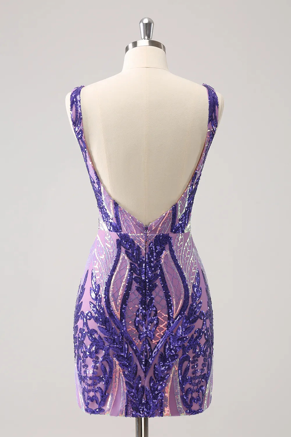 Side view of a woman in a purple sparkly V-neck bodycon sequin dress.