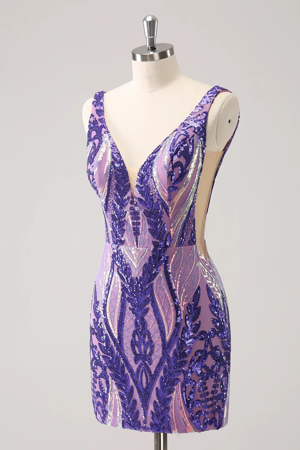 Back view of a woman in a purple sparkly V-neck bodycon sequin dress.