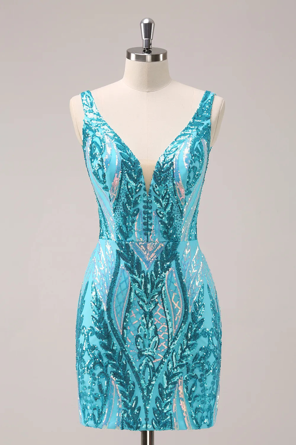 Woman posing in a blue sparkly V-neck bodycon sequin homecoming dress.