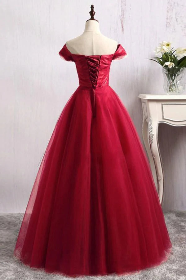 Back view of an A-line off-shoulder tulle prom dress.