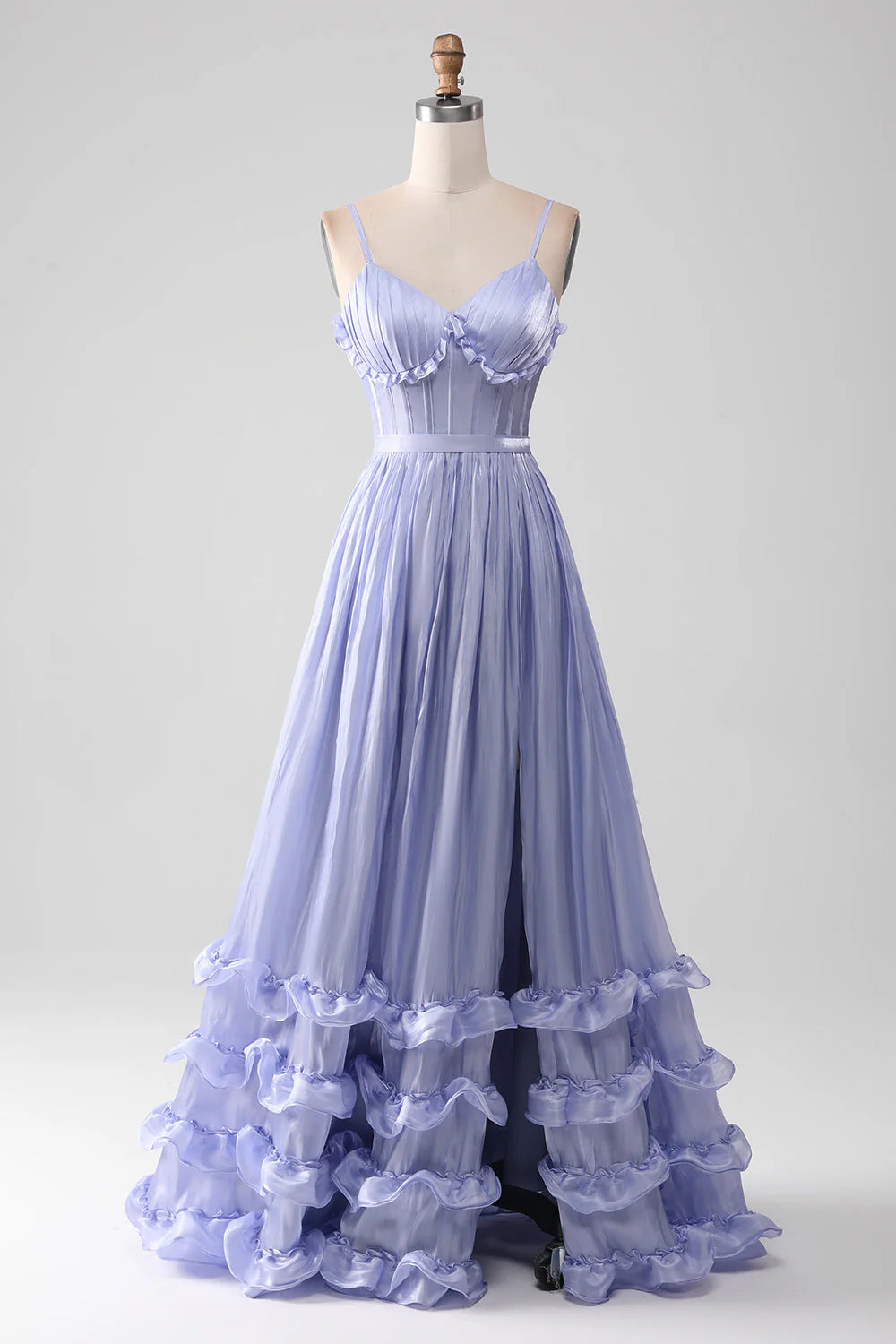 Lavender A-line prom dress with spaghetti straps and ruffles.