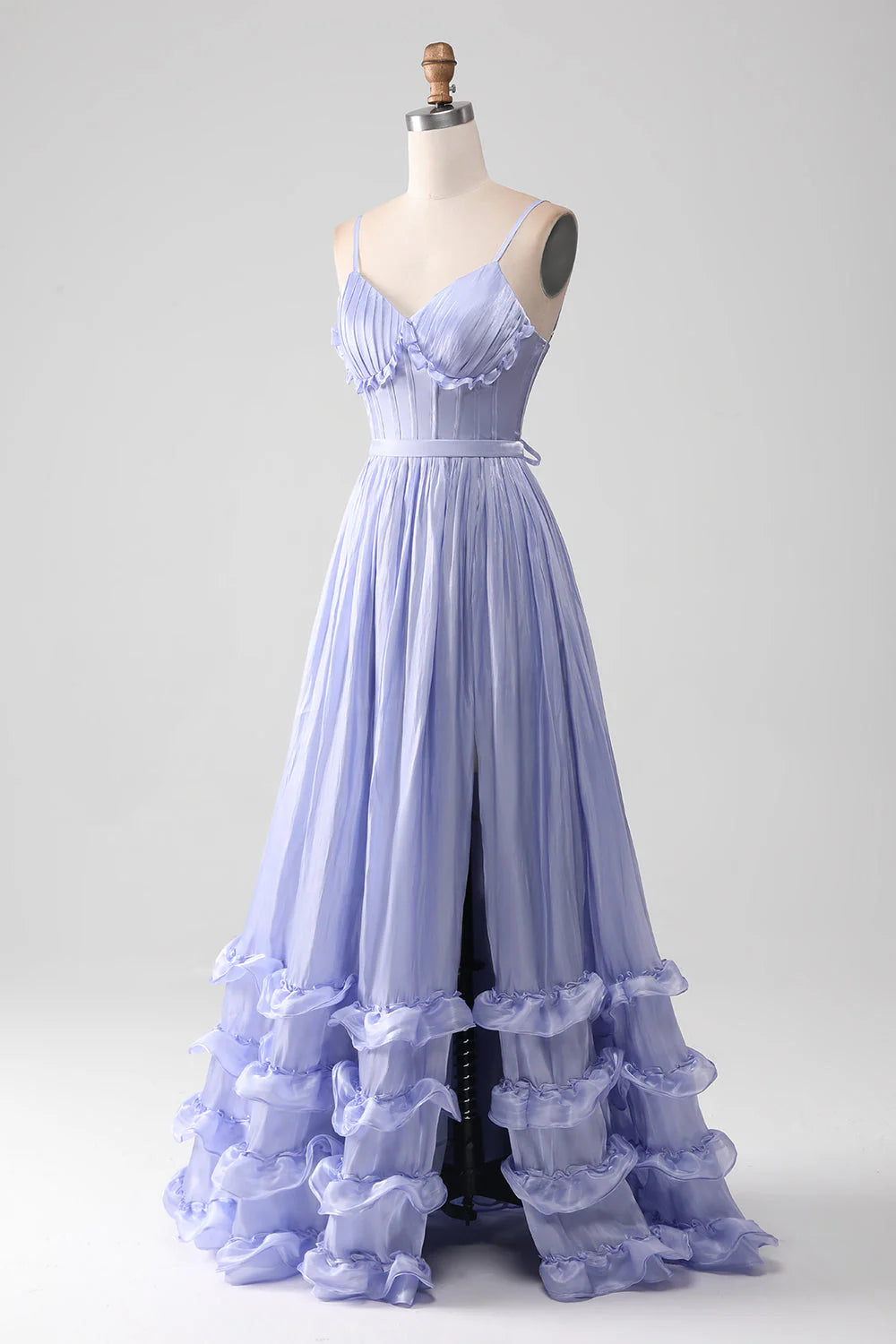 Side view of a lavender A-line prom dress, highlighting the ruffled details.