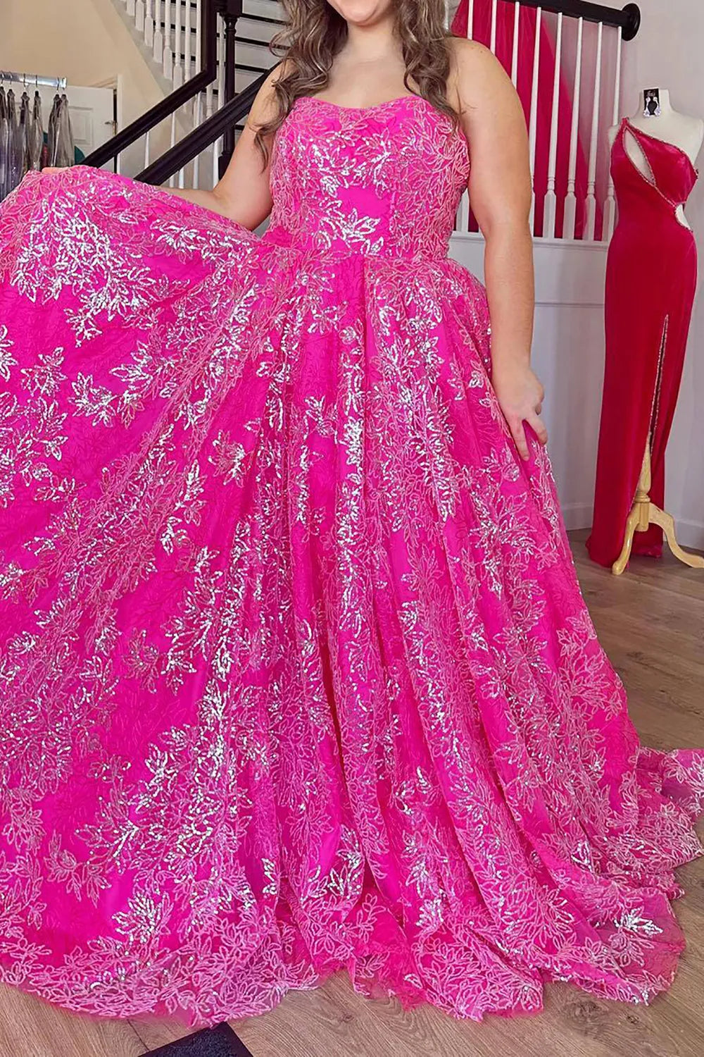 Close-up of the strapless bodice of a blue A-line long prom dress.