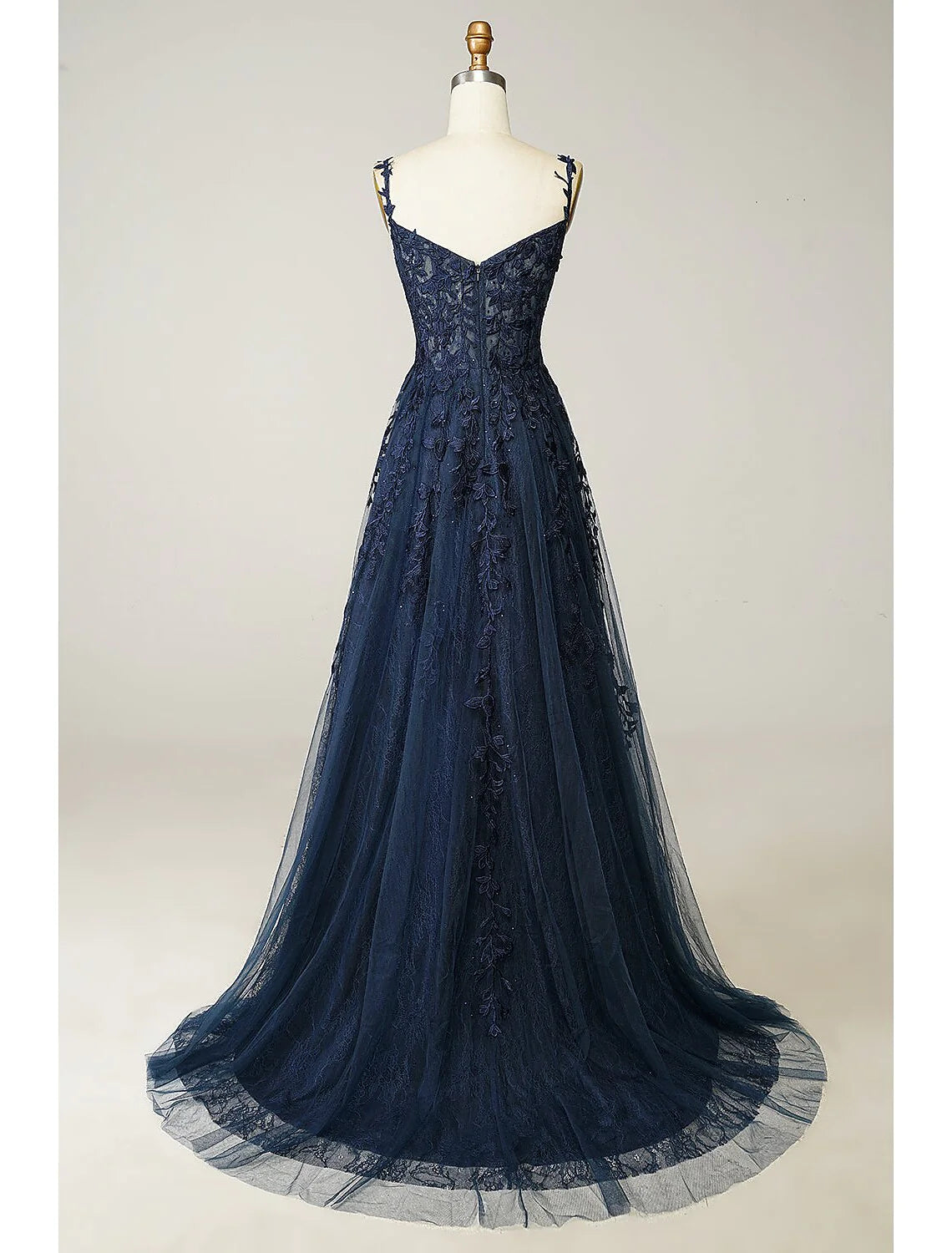 Back view of A-Line tulle prom dress with sweep train.