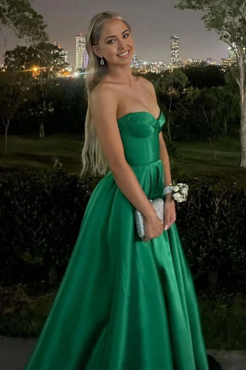 Back view of the elegant green A-line long prom dress.