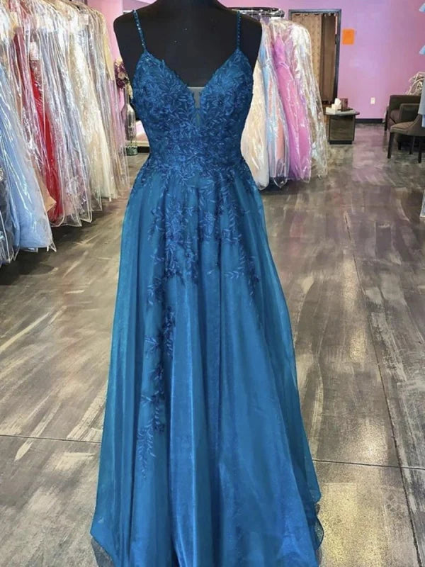 Model wearing an elegant A-Line V-Neck lace long formal prom dress.