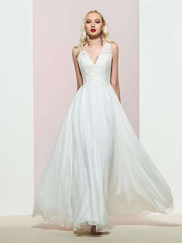 Elegant A-Line evening gown with V-neck and delicate appliques.