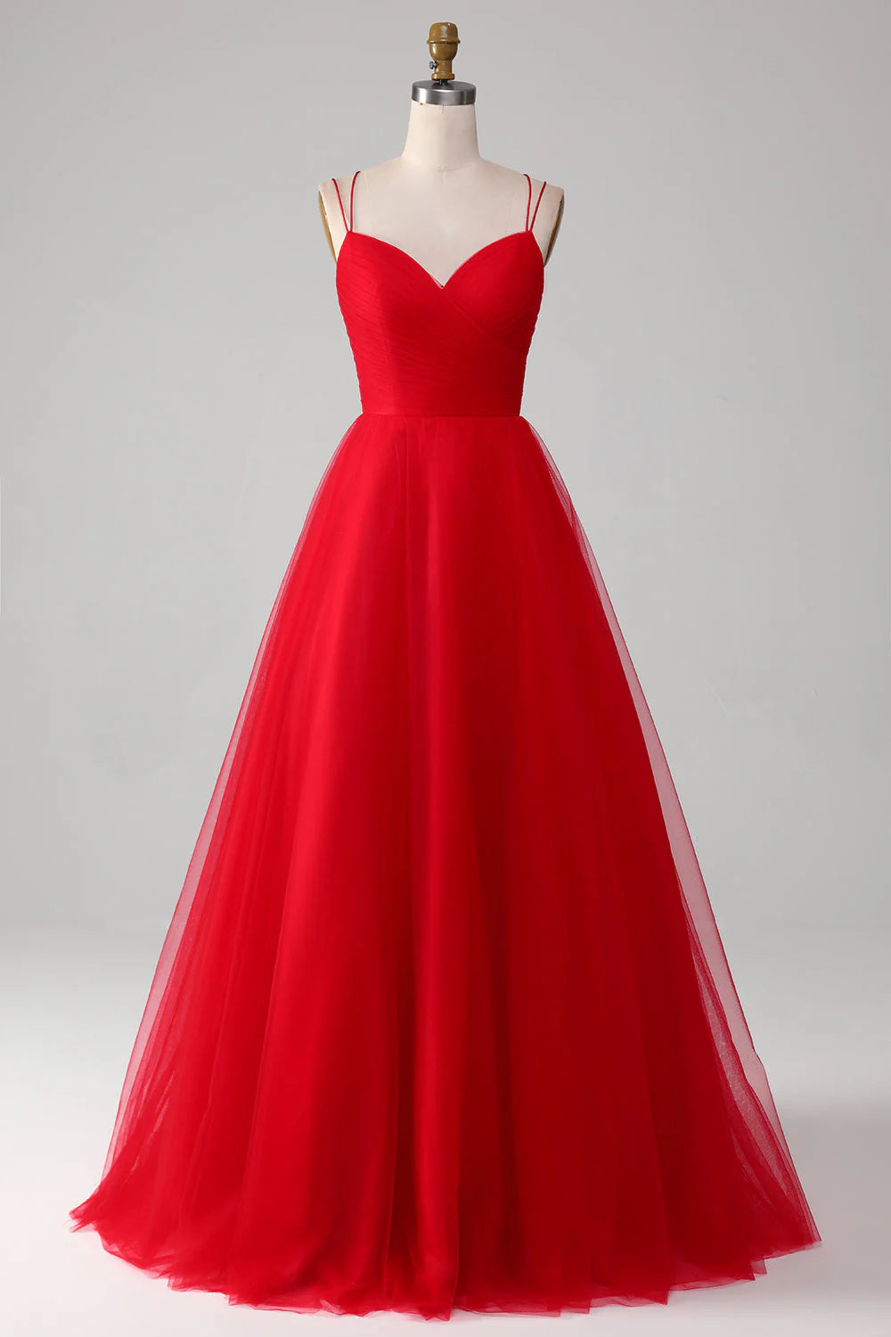 Red A-line long prom dress with V-neck and elegant criss-cross back.
