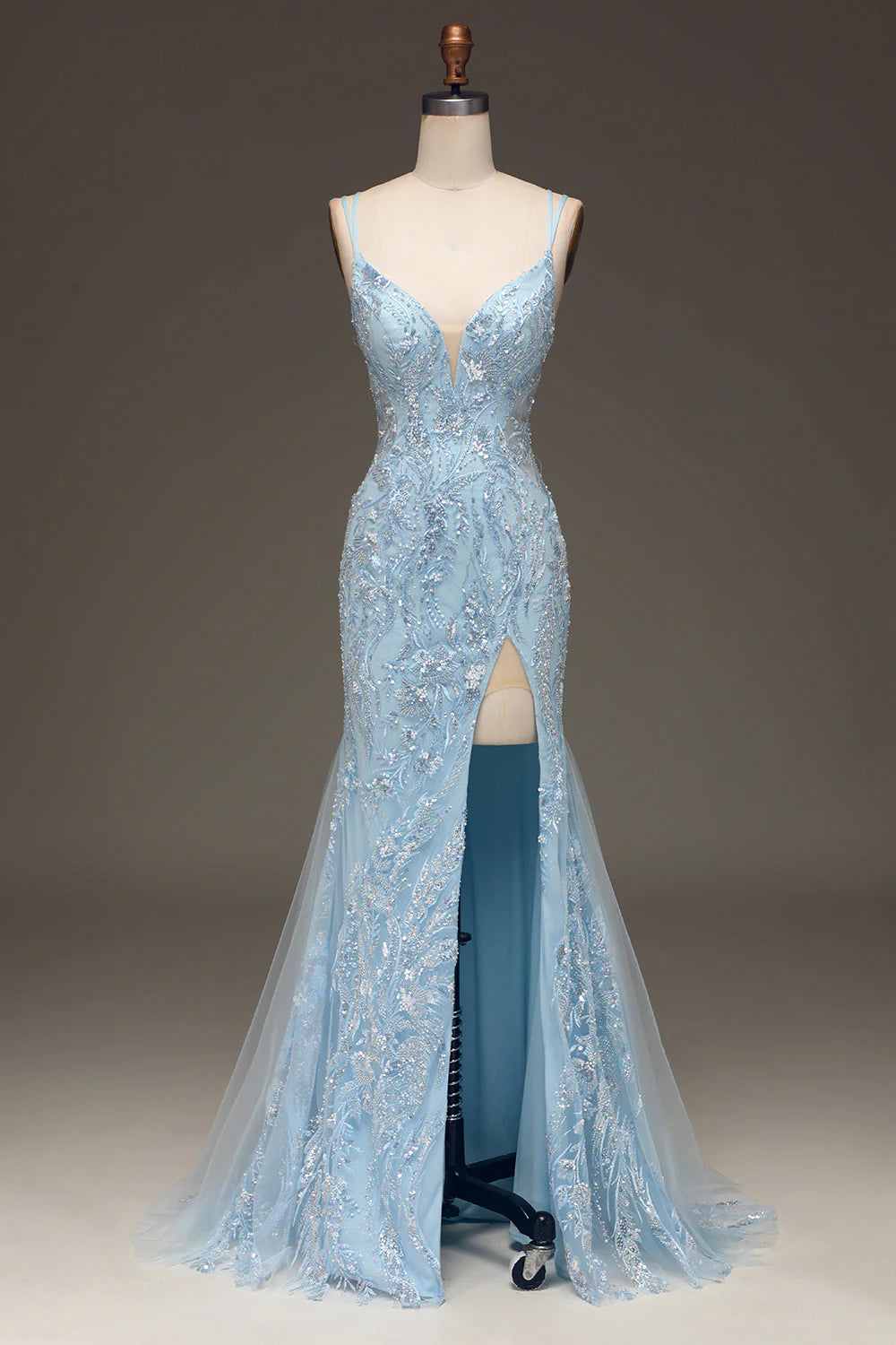 Light blue mermaid prom dress with intricate beading, front view.