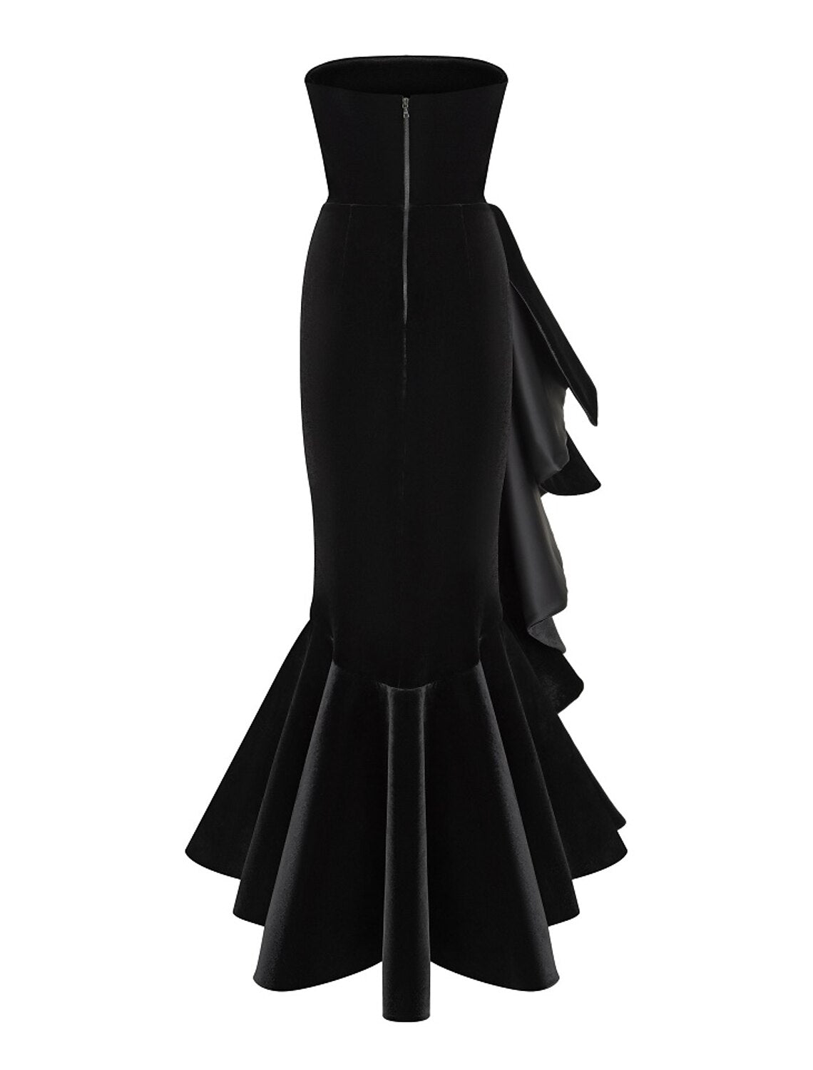 Close-up of the ruffled detail on a black velvet gown.