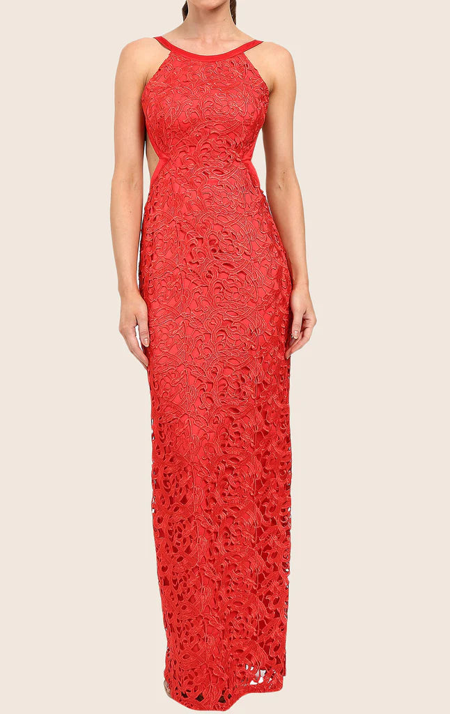 Woman wearing an elegant halter neck lace maxi prom dress.