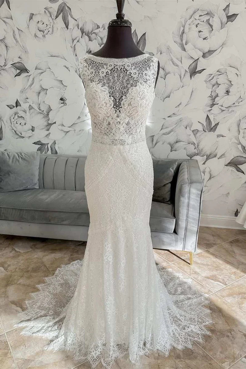 Front view of an elegant white mermaid lace wedding dress.