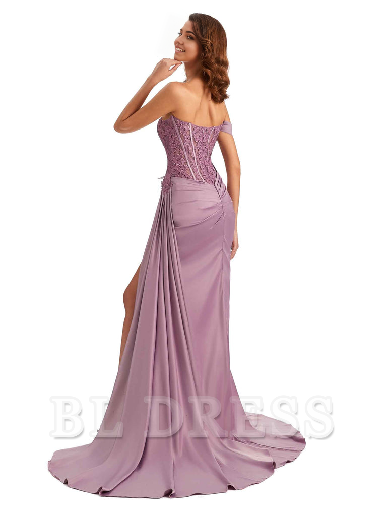 Full length view of a woman posing in a mermaid off-shoulder bridesmaid dress.