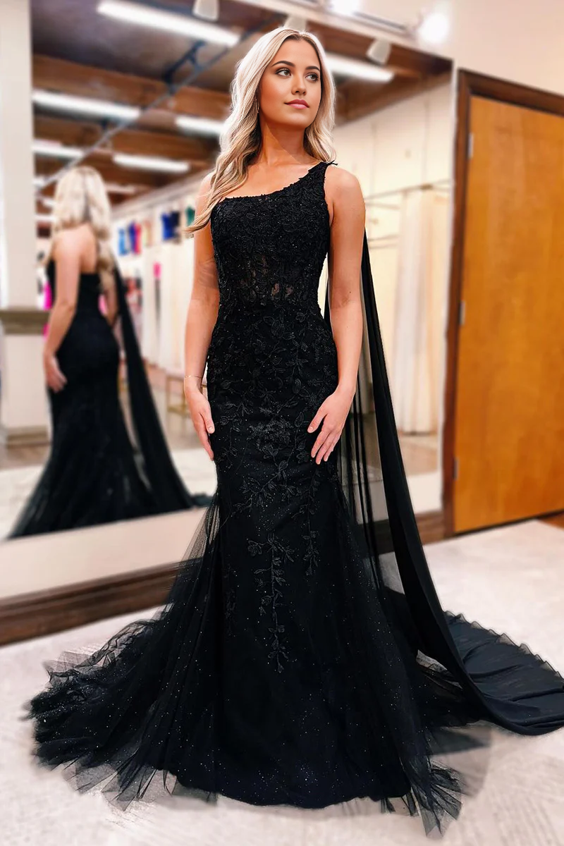 Model wearing a black mermaid one-shoulder long prom dress.
