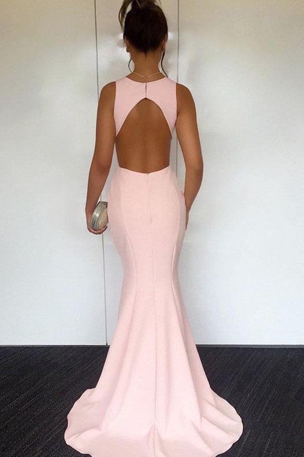 Back view of the pearl pink mermaid evening gown, showcasing the elegant open back design.