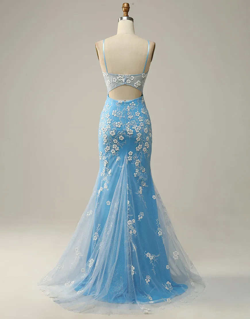 Side view of a woman in a mermaid prom dress with spaghetti straps and keyhole back.