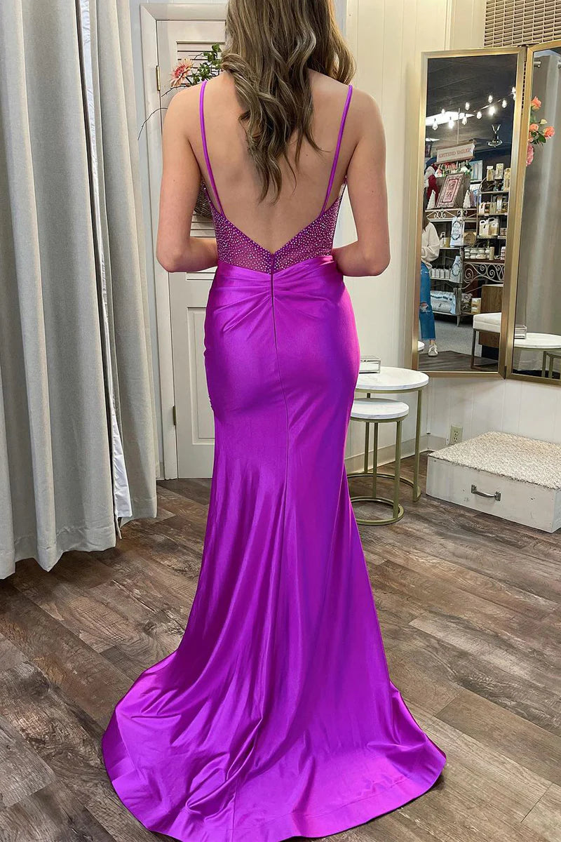 Back view of the purple mermaid prom dress, showcasing the long train and silhouette.