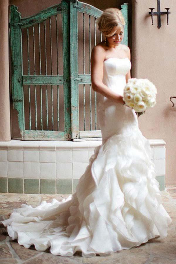 Elegant mermaid sweetheart organza wedding dress with a court train.