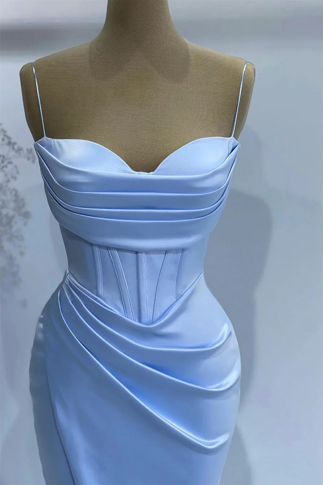 Ankle-length formal gown in mermaid style, perfect for parties.