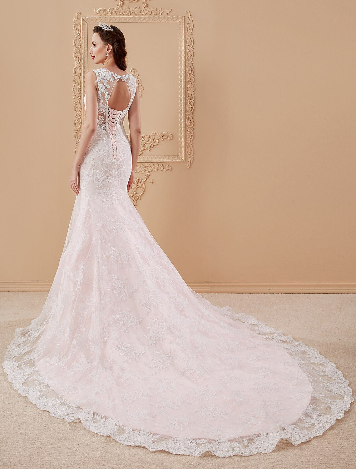 Back view of a Mermaid Trumpet wedding dress with court train.