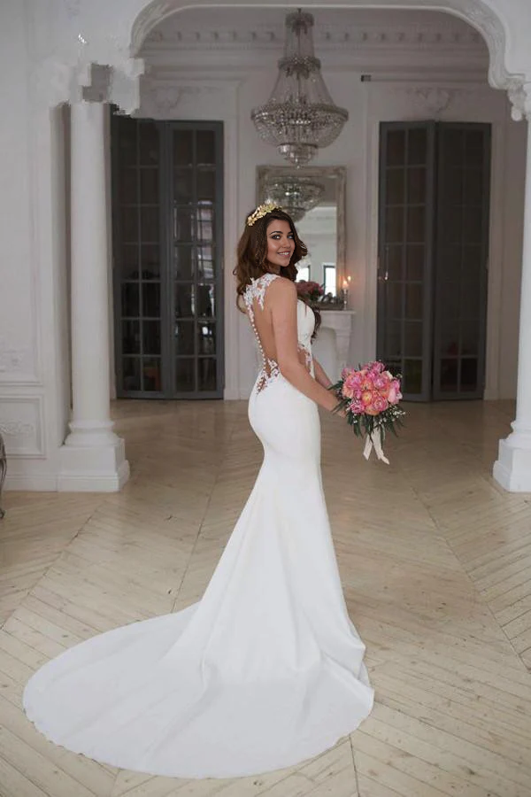 Close-up of intricate lace details on the mermaid wedding dress.