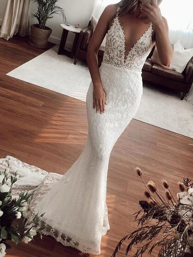 Stunning Mermaid V-neck lace and tulle long wedding dress.