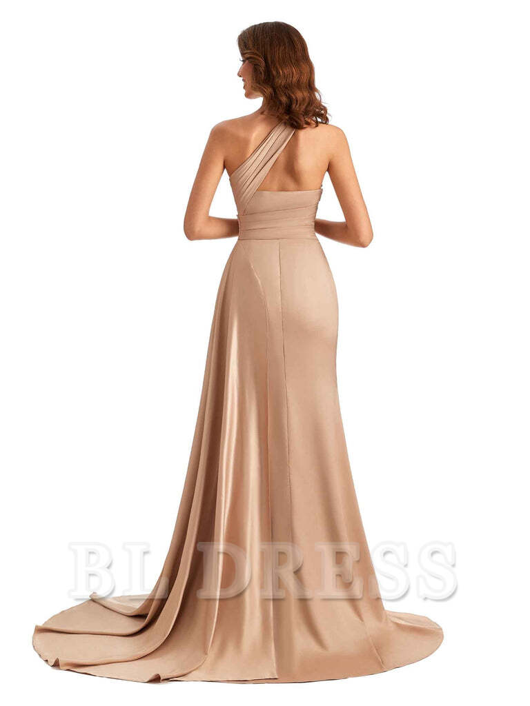 Back view of a one-shoulder mermaid satin evening gown.
