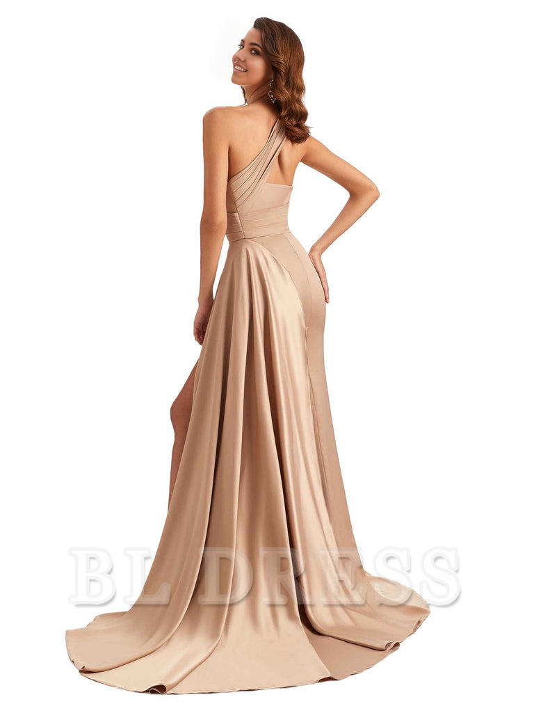 Close-up of the one-shoulder detail on a satin formal dress.