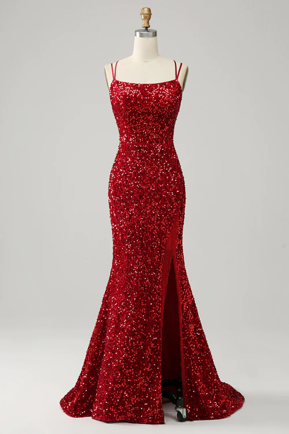 Front view of a red sequined mermaid dress, showcasing the spaghetti straps and shimmering fabric.