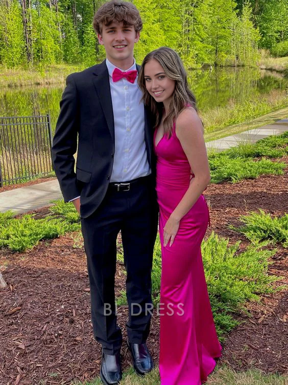 Model wearing a hot pink sheath V-neck long formal dress.