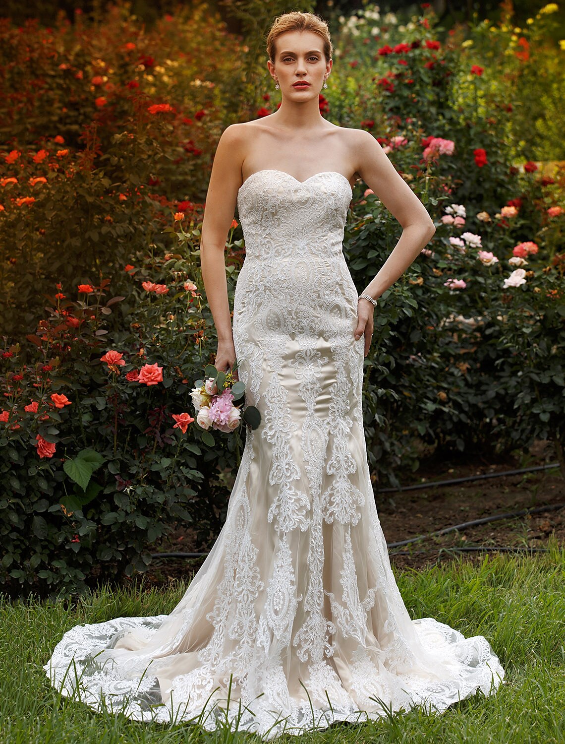 Close-up of the intricate lace and beading details on the bodice of the mermaid wedding dress.