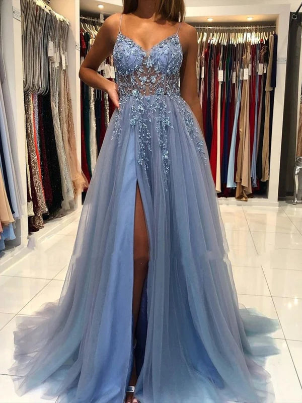 Front view of a model wearing the V-neck open back beaded long prom dress.