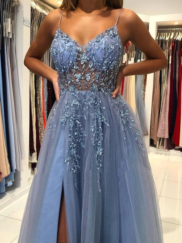 Detailed view of the intricate beading on the elegant prom gown.