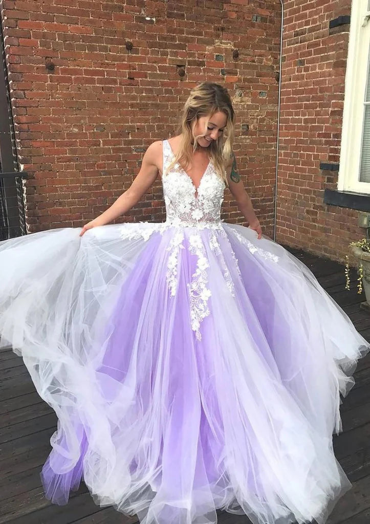 Full view of an elegant V-neck tulle ball gown with a backless design, perfect for prom.