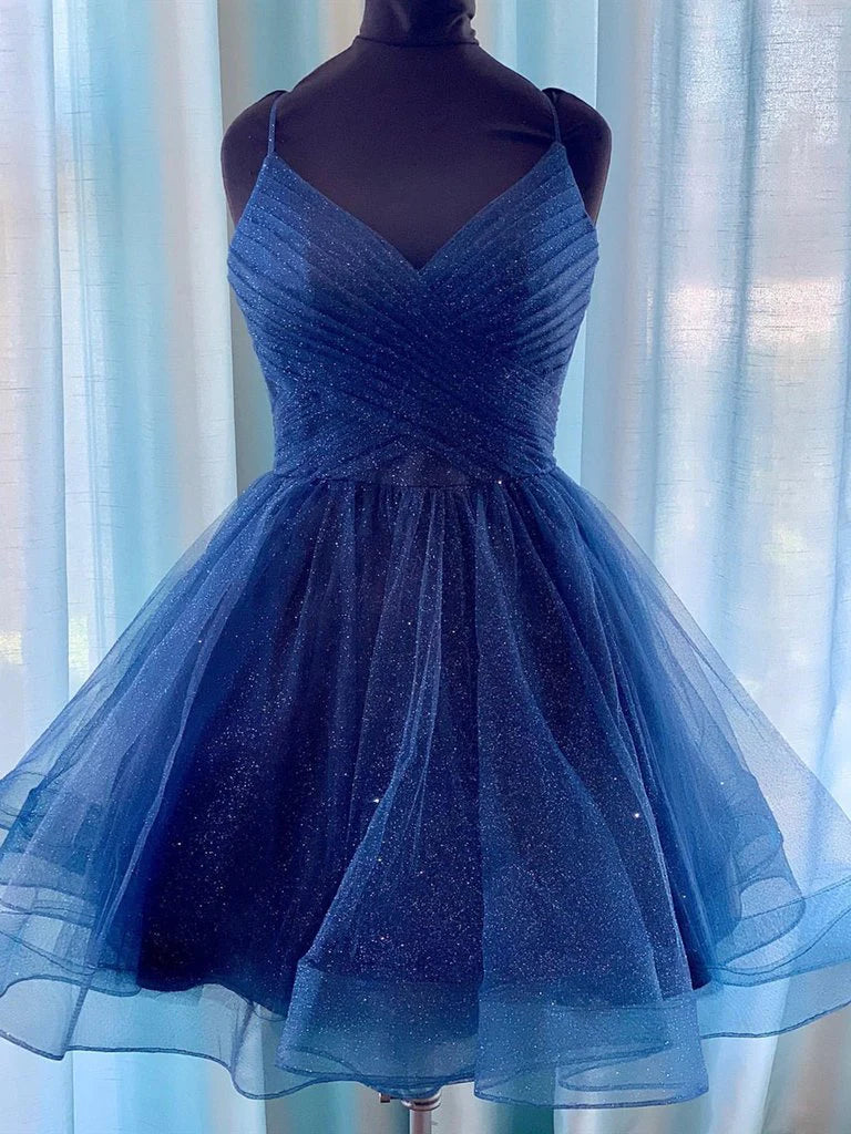 Woman wearing an A-line V-neck short formal dress.