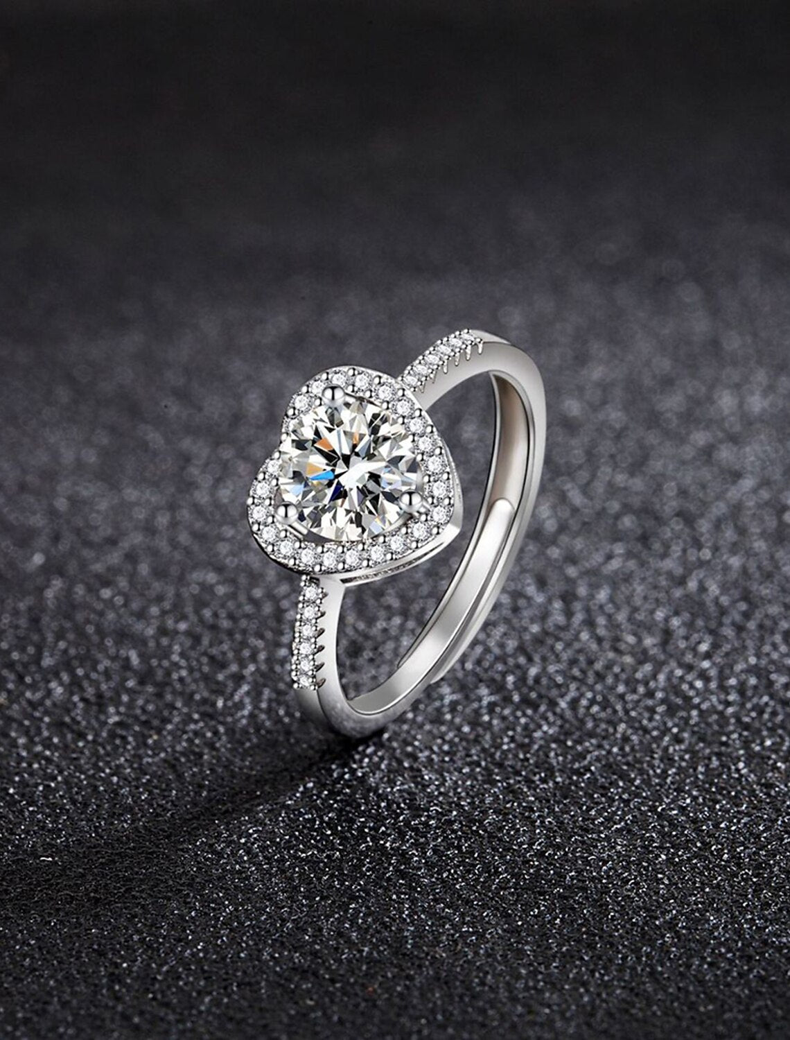 Side view of the geometrical S925 silver ring with sparkling rhinestones.