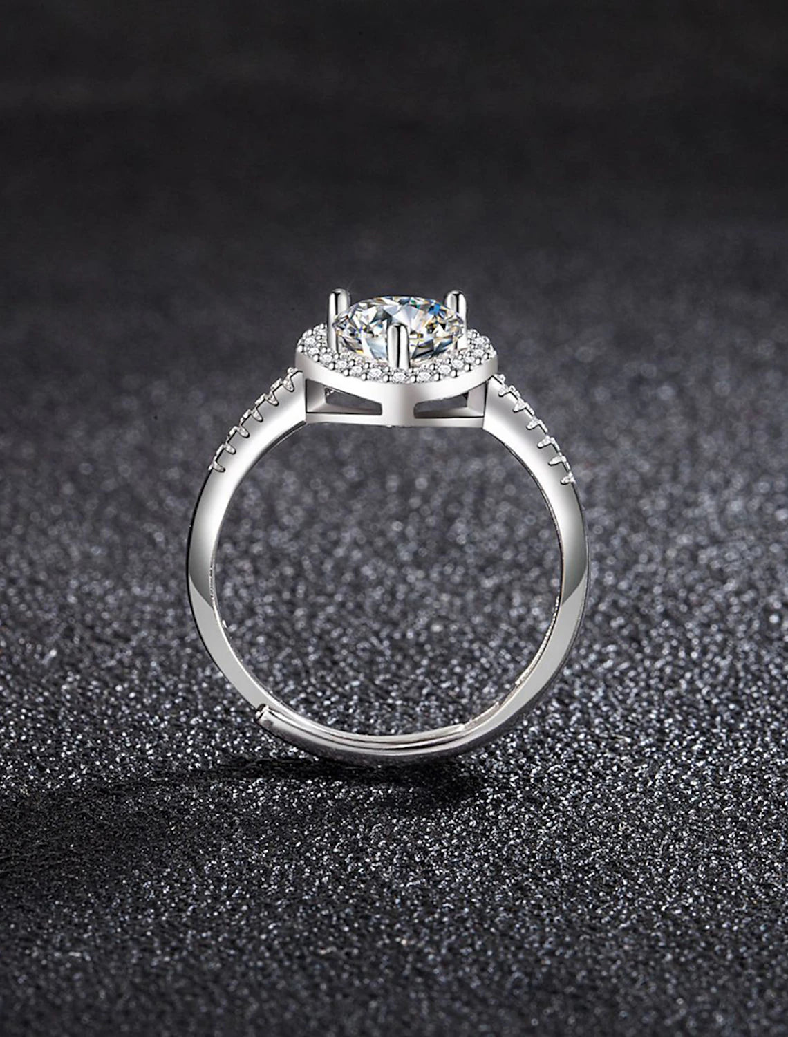 Elegant S925 silver rhinestone ring worn on a finger.