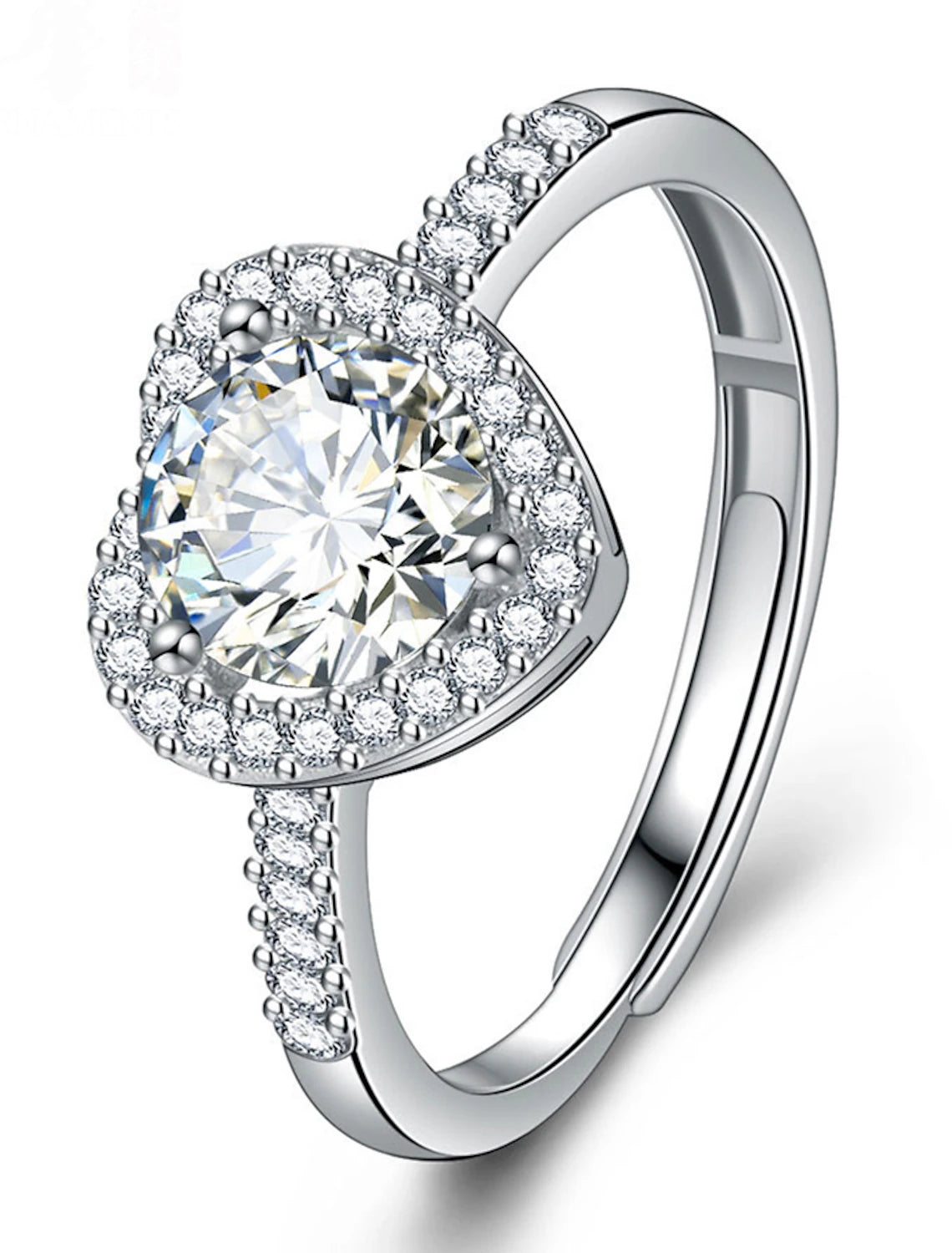 Detailed view of the geometrical pattern and rhinestones on the silver ring.
