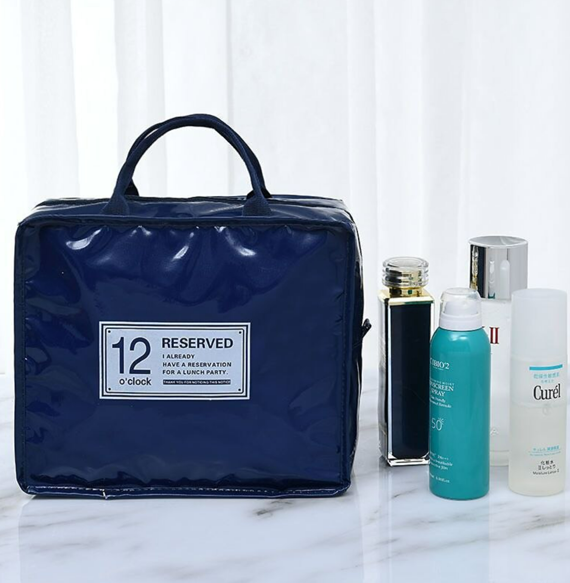 Compact travel cosmetic bag, ideal for toiletries.