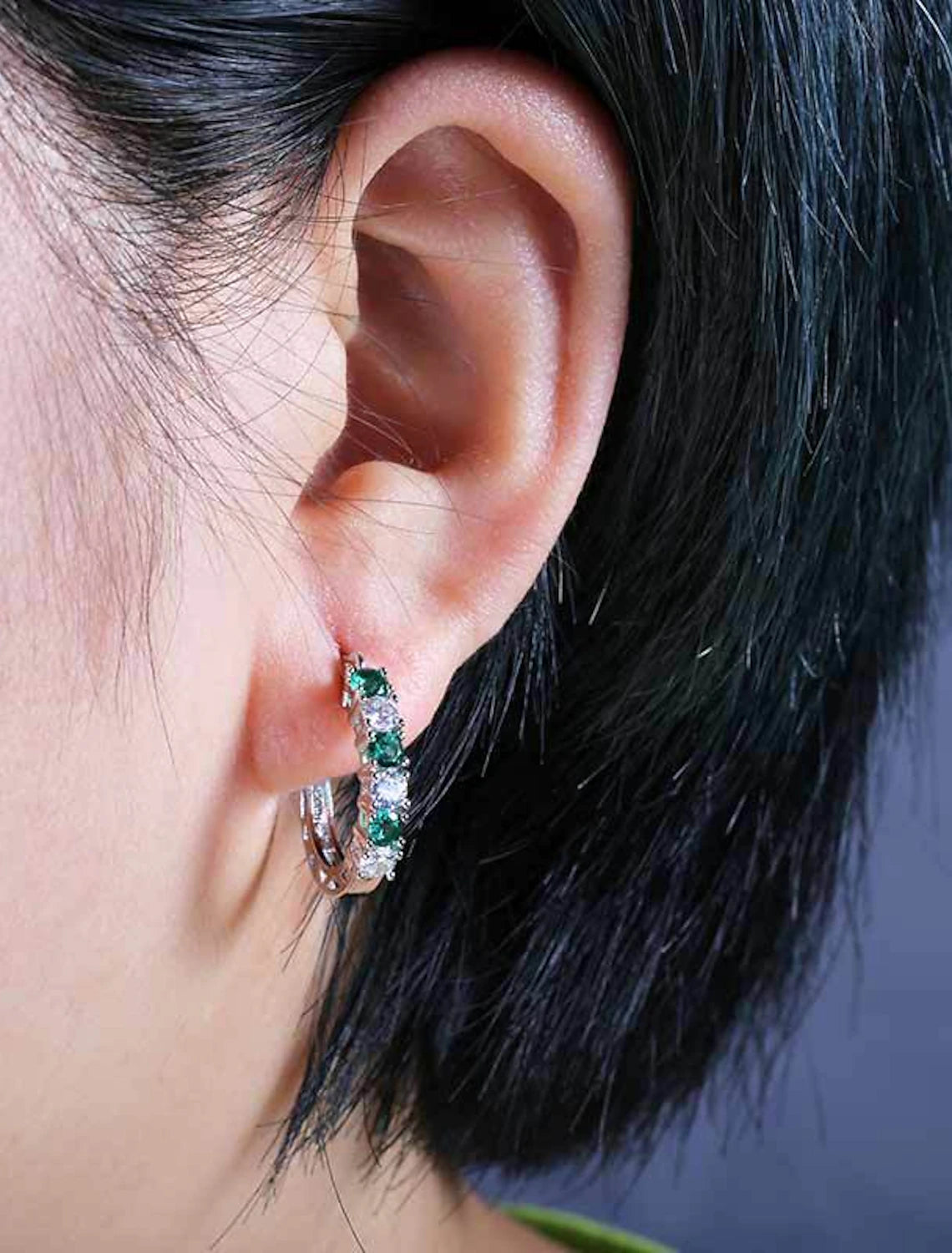 Pair of zircon hoop earrings.