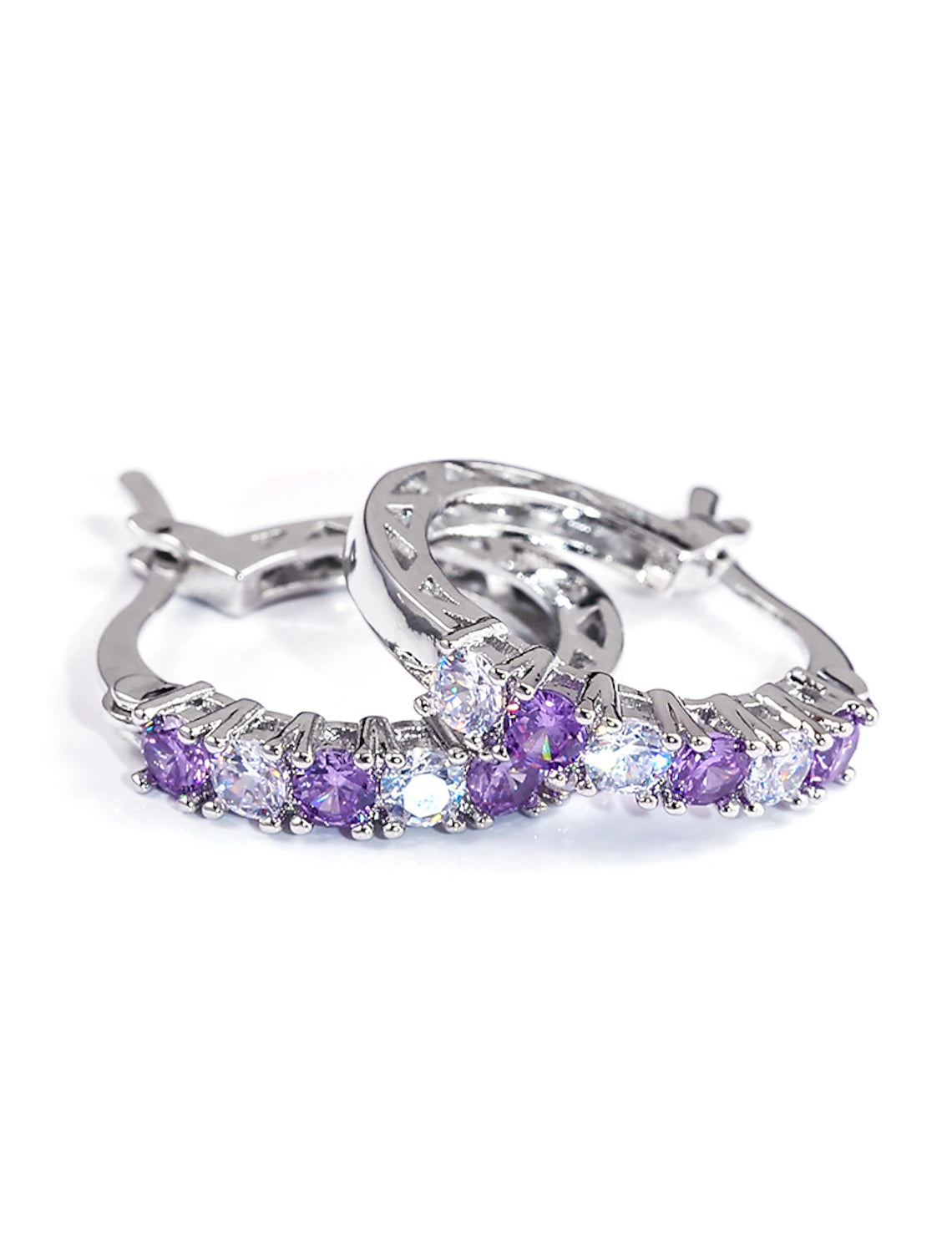 Model wearing purple zircon hoop earrings.
