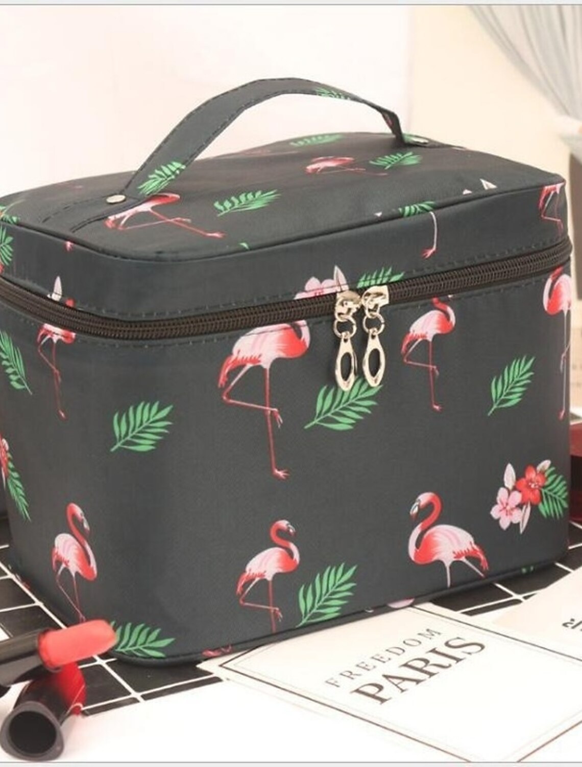 Open pink cherry cosmetic bag showing interior.